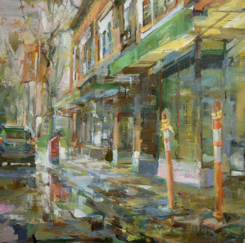 Triumph of morning. Streetscape painting by L:eanne M Christie. The viewer is standing on a quiet stretch of East Georgia street on an wet Autumn morning.