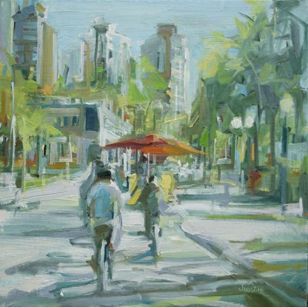 Leanne M Christie, urban oil painting of Beach Ave with cyclists and a red umbrella from a hot dog stand. Leanne Christie places the viewer behind the cyclist looking up Beach Avenue. The brushwork is energetic. Genrre: Urban streetscape. Medium: Oil on canvas. Artist: Leanne M Christie