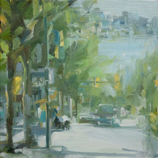 Original oil painting by Leanne M Christie of lower Lonsdale Ave in North Vancouver. Leanne Christie describes the painting in soft blues, greens and yellow with soft lighting. You are standing in the road, looking at the unobstructed view. Genre: Urban landscape, streetscape.