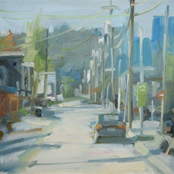 A small oil painting of a street near the Moody Centre Station. There are low buildings on either side of the street, a car parked on the right and the street is lined by utility poles and lamp posts bearing blue flags. The painting is loosely painted in soft greys, greens and whites and the pop of orange of the buildings and red of the no entry sign give the painting a nice pop. The painting by Leanne M Christie has a feeling of space and serenity in an urban environment.