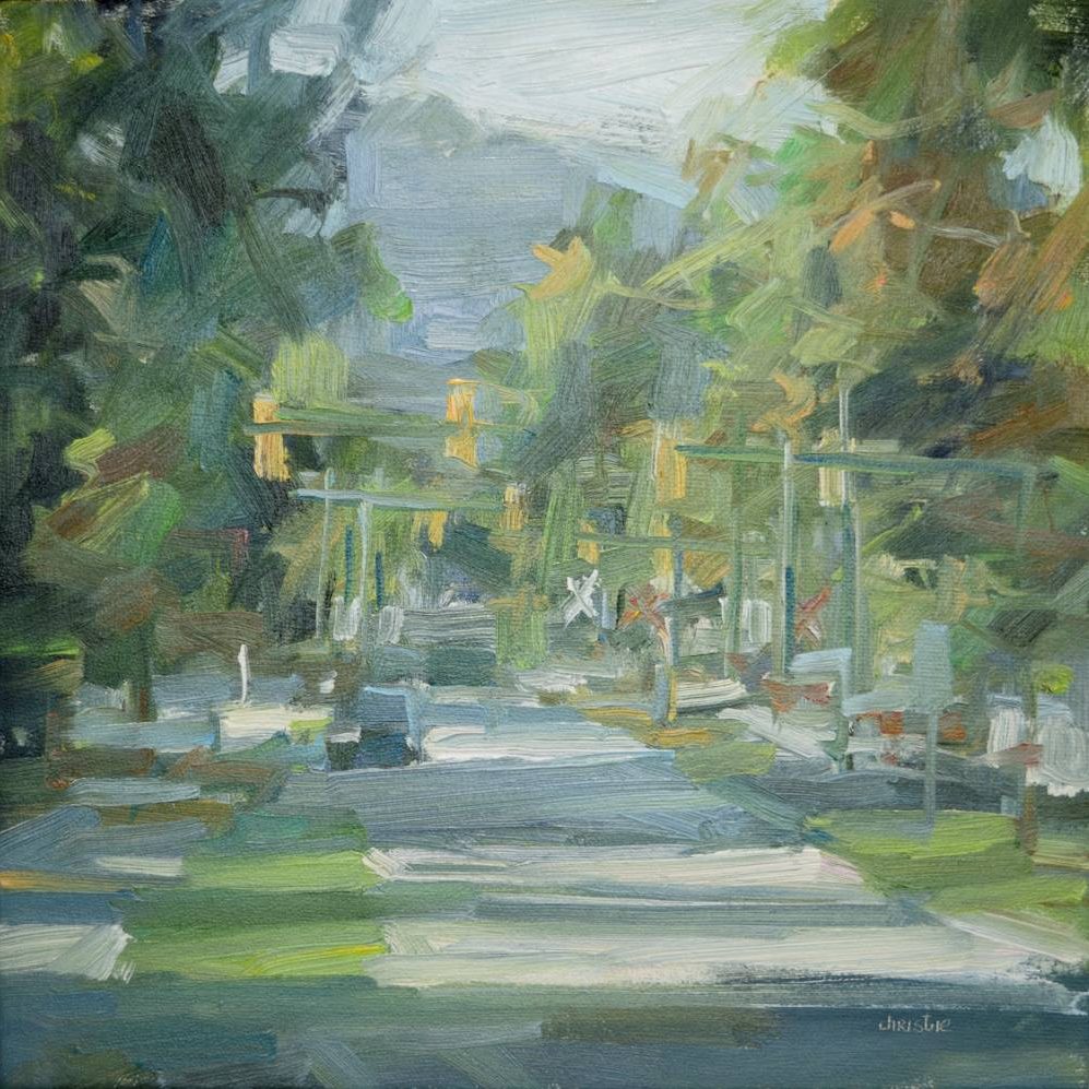 The view west looking down Murray Street with Burnaby Mountain in the background. The viewer is standing on the middle Island near Suter Brook Village and the feeling of the painting is of summer. The sunshine falling on the street through the trees creates an alternating pattern of grey and white. Leanne Christie describes a street lined with green trees and the mountain and the sky are soft greyish blues. There is a car in the distance and the traffic lights that are described with a soft yellow. Painting by Urban oil painter, Leanne M Christie. Genre: Streetscape, Urban Painting. Available: Van Dop Gallery