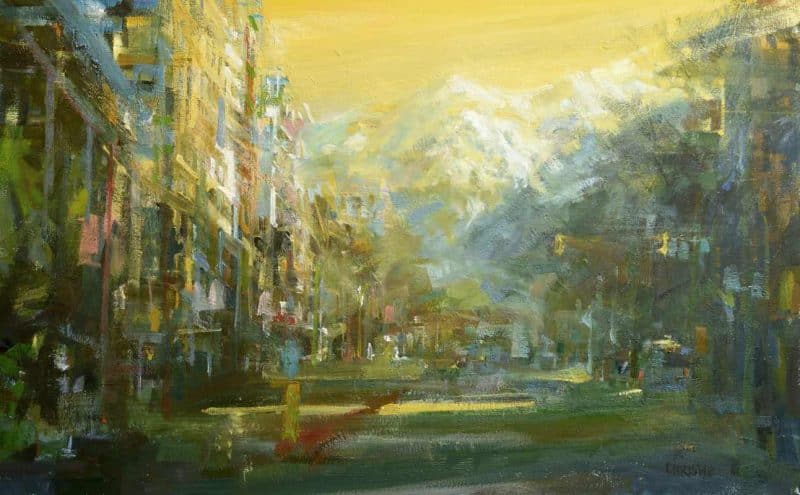 Tilting back to the long warm days Warm Urban oil painting of the view looking north along Main street, China Town, Vancouver with a snow capped Grouse Mountain in the background. Leanne Christie places the viewer in the middle of the street that has long shadows. The brushwork is suggestive. Genre: Urban art, streetscape. Artist: Leanne M Christie. Location: Main Street, China Town, Vancouver. Medium: Oil on canvas.